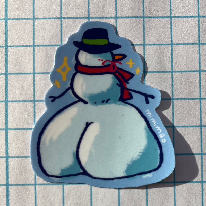 Sticker of a snowman with a top hat and red scarf on grid paper