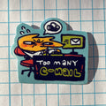Cartoon sticker of a cat at a computer with 'Too Many Email' text on a grid background