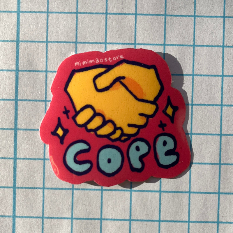 Sticker with handshake and 'COPE' text on a grid background