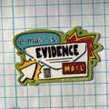 Colorful patch with text 'e-mail is EVIDENCE MAIL' on a grid background