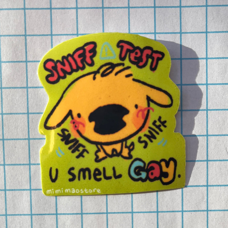 Sticker with a cartoon dog and text on a grid background