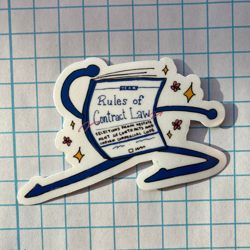 Sticker of a book titled 'Rules of Contract Law' on a grid background