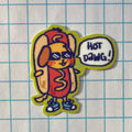 Cartoon hot dog with sunglasses and a speech bubble saying 'Hot Dawg!' on a grid background