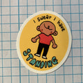 Round sticker with a cartoon character and text 'I swear I have standing' on a grid background