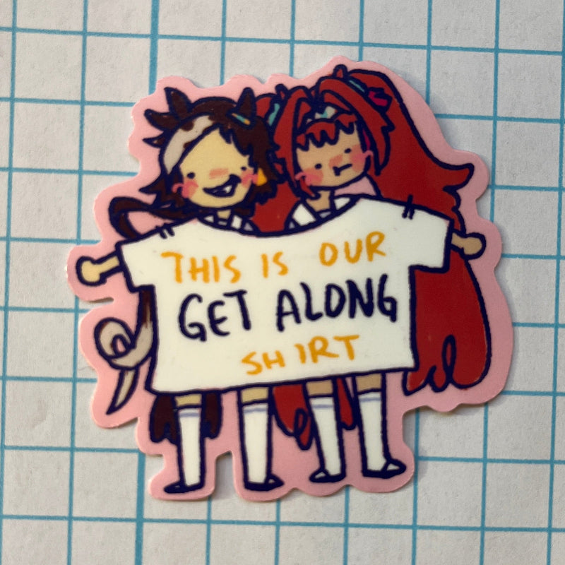 Sticker of two cartoon characters sharing a shirt with text on a grid background